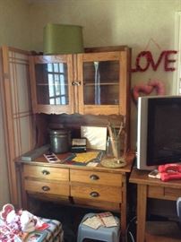 Sow belly antique kitchen cabinet.