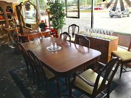 Mahogany, Antique, Dining Room Table with leaf that folds down inside table for easy storage, plus 8 Matching Upholstered Chairs and one small bench seat