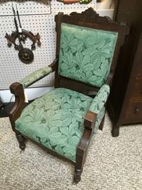 Upholstered vintage chair on casters