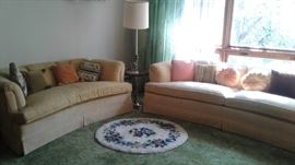 Comfy sofas, hooked rug