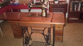 Yummy!! Singer with cast iron base, treadle pedal and great gold graphics.  