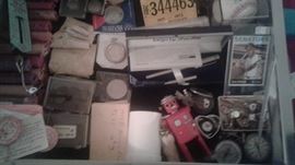 Coins, wind up robot, watches, cuff links, signed baseball, signed baseball card, hunting license, targa oen set, more