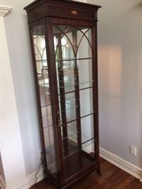  Gorgeous Jasper display cabinet featuring a mirrored back 4 adjustable glass shelves and built in light.  measures approximately 79"H x 24"W x 16"D