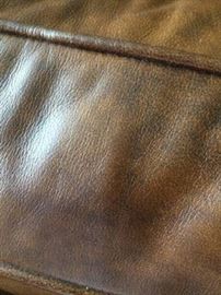The leather is in dark brown and is very soft and supple.
