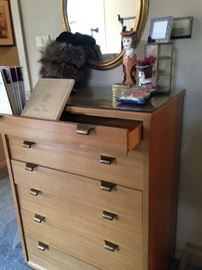 One of two Mid-Century style chest of drawers . . . very similar in style
