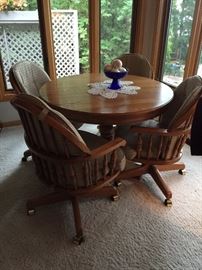 Oak table and chairs with leafs