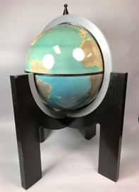 Lot 69 Modern World Globe Bar Cabinet. Globe opens to ex