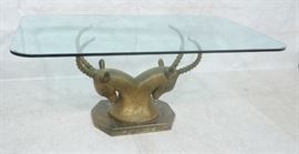 Lot 124 Glass Top Brass Antelope Base Dining Table. Figur