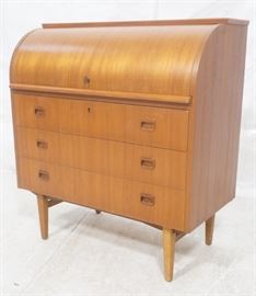Lot 224 Danish Teak Modern Roll Top Desk. Raised on legs.