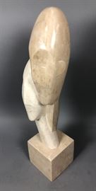 Lot 249 Laminated Stone Modernist Double Head Sculpture. 