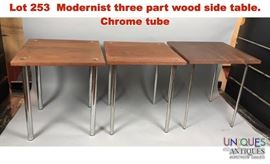 Lot 253 Modernist three part wood side table. Chrome tube