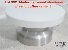 Lot 332 Modernist round aluminum plastic coffee table. Li