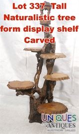 Lot 337 Tall Naturalistic tree form display shelf Carved 