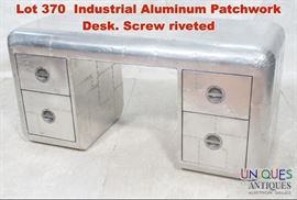 Lot 370 Industrial Aluminum Patchwork Desk. Screw riveted