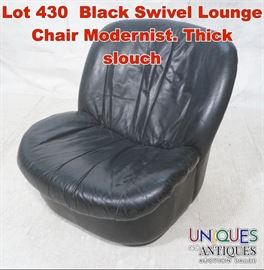 Lot 430 Black Swivel Lounge Chair Modernist. Thick slouch