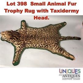 Lot 398 Small Animal Fur Trophy Rug with Taxidermy Head. 