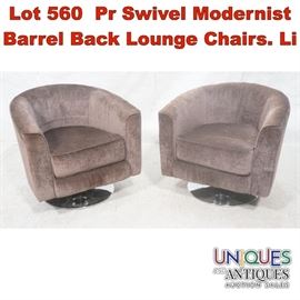 Lot 560 Pr Swivel Modernist Barrel Back Lounge Chairs. Li