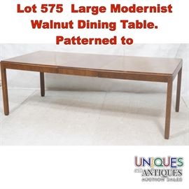 Lot 575 Large Modernist Walnut Dining Table. Patterned to