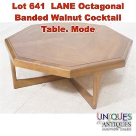 Lot 641 LANE Octagonal Banded Walnut Cocktail Table. Mode