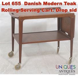 Lot 655 Danish Modern Teak Rolling Serving Cart. Drop sid