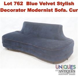 Lot 762 Blue Velvet Stylish Decorator Modernist Sofa. Cur