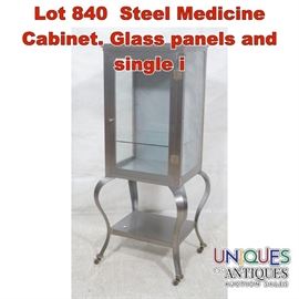 Lot 840 Steel Medicine Cabinet. Glass panels and single i