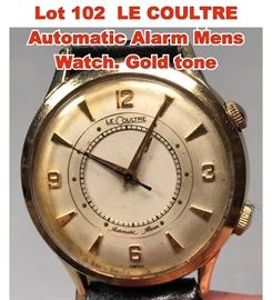 Lot 102 LE COULTRE Automatic Alarm Mens Watch. Gold tone
