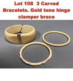Lot 108 3 Carved Bracelets. Gold tone hinge clamper brace