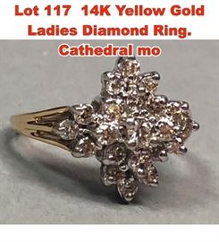 Lot 117 14K Yellow Gold Ladies Diamond Ring. Cathedral mo