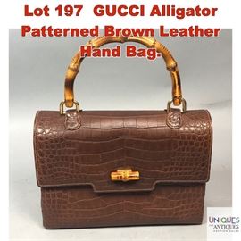 Lot 197 GUCCI Alligator Patterned Brown Leather Hand Bag.