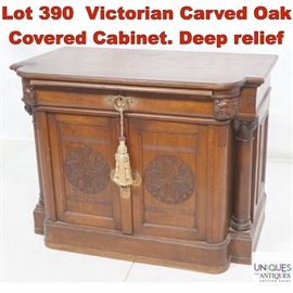Lot 390 Victorian Carved Oak Covered Cabinet. Deep relief