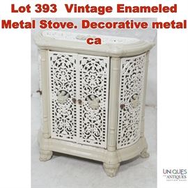Lot 393 Vintage Enameled Metal Stove. Decorative metal ca