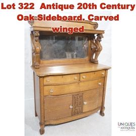 Lot 322 Antique 20th Century Oak Sideboard. Carved winged