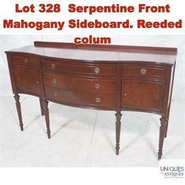 Lot 328 Serpentine Front Mahogany Sideboard. Reeded colum