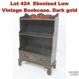 Lot 424 Ebonized Low Vintage Bookcase. Dark gold painted