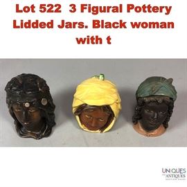 Lot 522 3 Figural Pottery Lidded Jars. Black woman with t