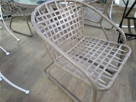 Close up of Brown Jordan sled chair-vintage in adobe color-part of dining set of 4 w/ glass top table