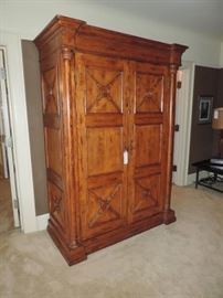 While this is large .... it is also WONDERFUL...perfect for an entertainment center...this would also make a good "office" or an armoire...MANY OPTIONS !