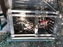 Antique lobster trap with metal lobster
