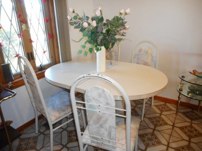 5 White Metal Side chairs. Dining Table
