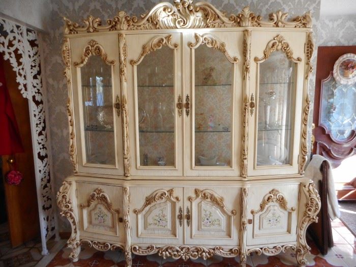 Italian Romantic,Cinderella Style, Hand Carved. Rosebuds, Floral, Silk Brocade Inside Backdrop. Glass Doors, Glass Shelves, Lighted. Storage. Quite Beautiful. Shabby Chic!!