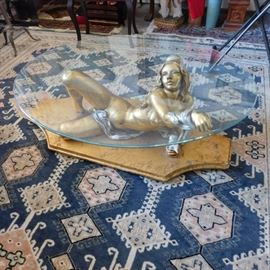 gold nude woman coffee table with glass top