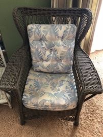 Large wicker chair ready for your sun porch. Two more of different style ready for garden art!