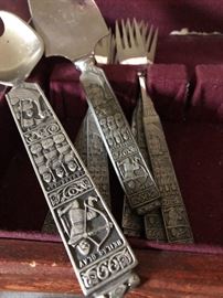 Heilag Olav og Hans Menn (translated as Saint Olav and his men) pewter flatware from Norway. Partial set with serving pieces. The most unusual set of flatware I have ever sold! Even the back tells a story