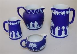Four Wedgewood pitchers