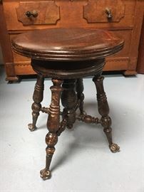 Antique spool with glass ball and claw feet