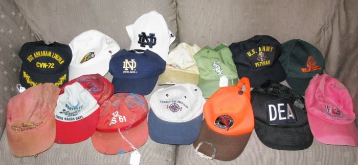 collection of baseball caps. 