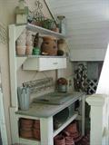 Pottiing bench; lots of pots