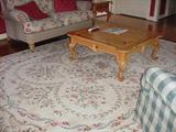 Pine coffee table and Karastan rug