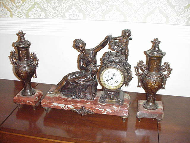 19th c. Deschamps French marble and bronze figural mantle clock with Limoges face and garniture set
